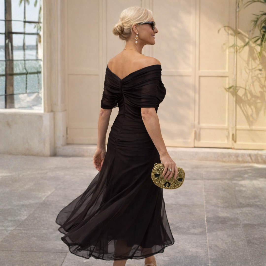 Vestido largo elegante con hombros descubiertos