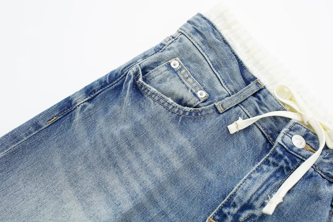 Jeans clásicos y elegantes de mujer de tiro medio con pierna recta y cordones