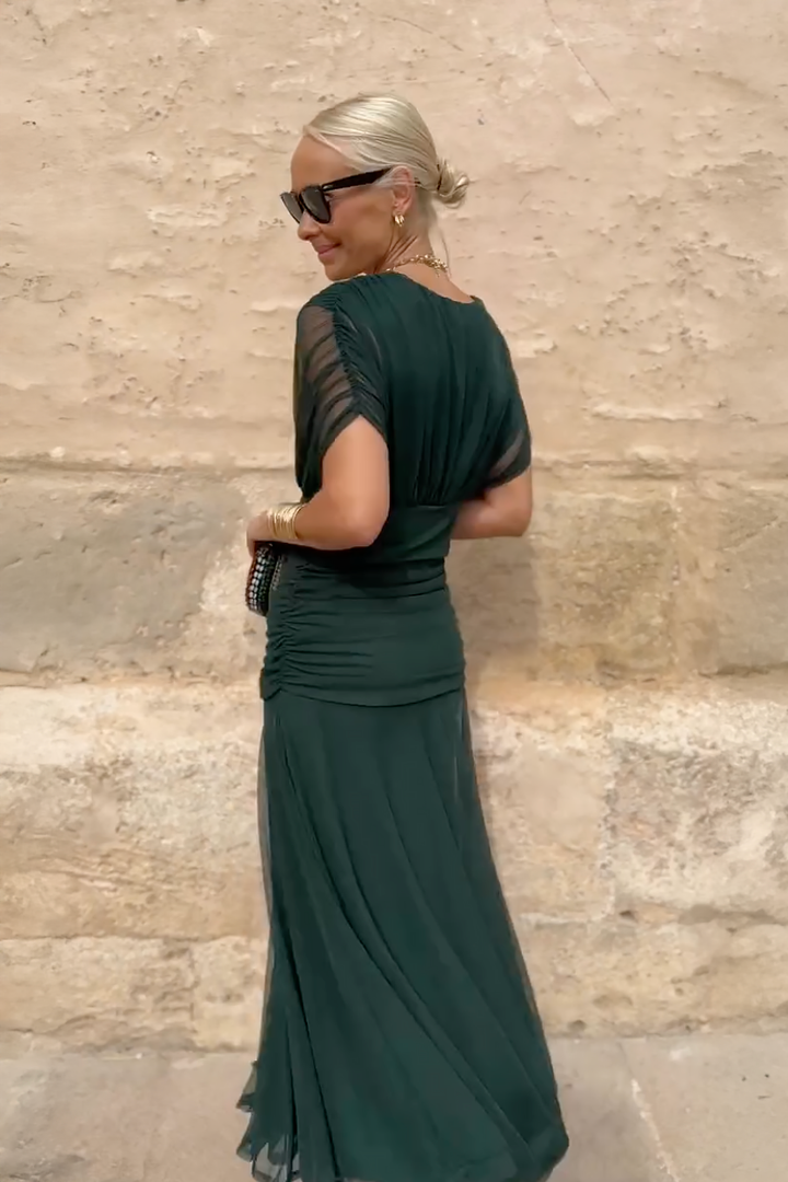 Elegancka długa sukienka na imprezę z dekoltem w serek