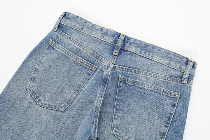 Jeans clásicos y elegantes de mujer de tiro medio con pierna recta y cordones