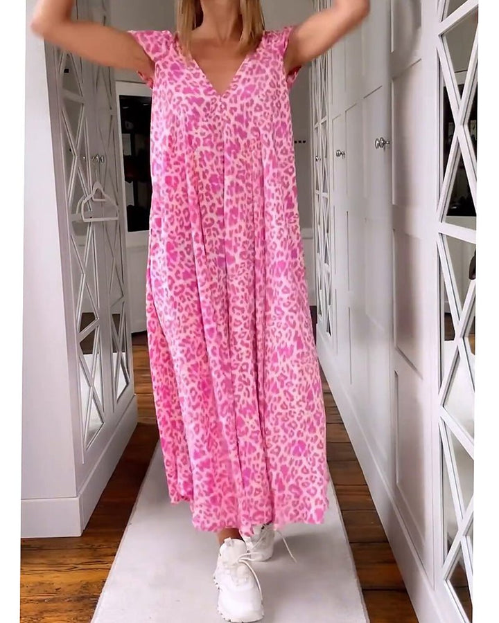 Elegancka sukienka w kwiaty z dekoltem w serek