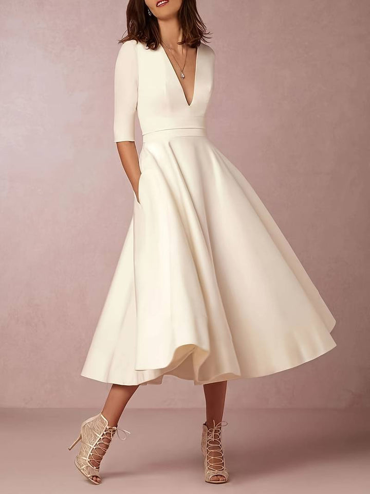 Vestidos midi acampanados para invitadas a bodas, listos para eventos formales
