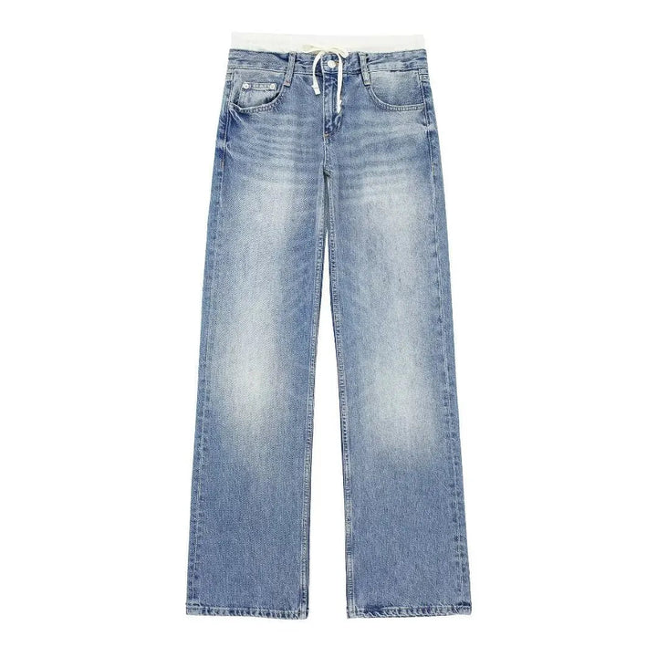 Jeans clásicos y elegantes de mujer de tiro medio con pierna recta y cordones