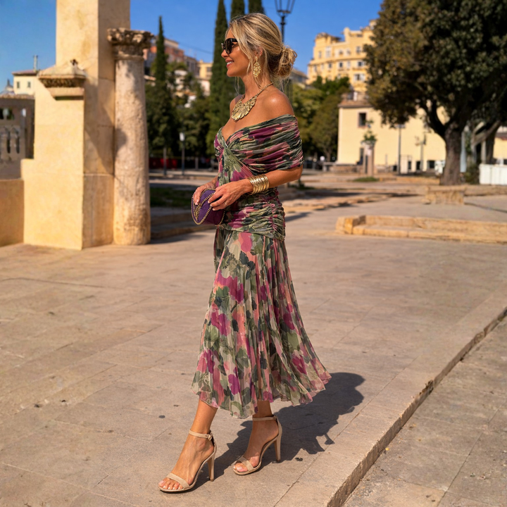 Vestido largo elegante con hombros descubiertos