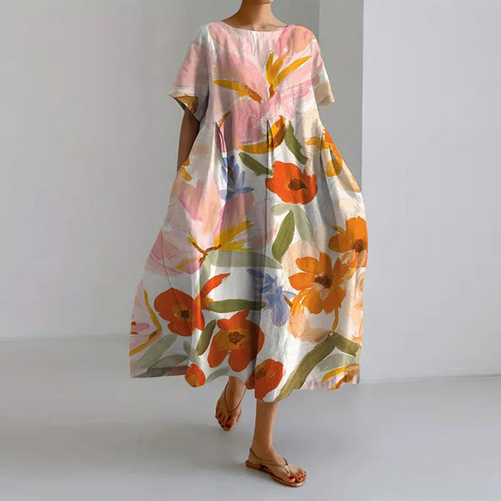 Vestido de verano femenino vaporoso y ligero con estampado floral en acuarela