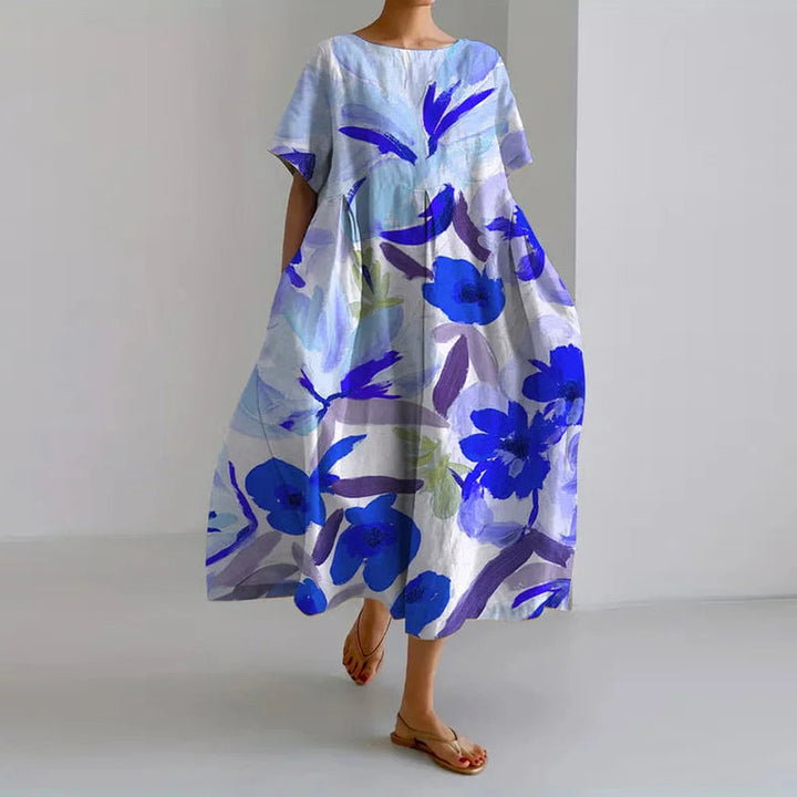 Vestido de verano femenino vaporoso y ligero con estampado floral en acuarela