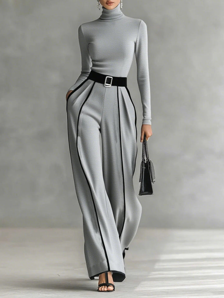 Conjunto de pantalones con cinturón y cuello alto