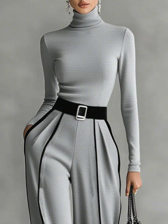 Conjunto de pantalones con cinturón y cuello alto