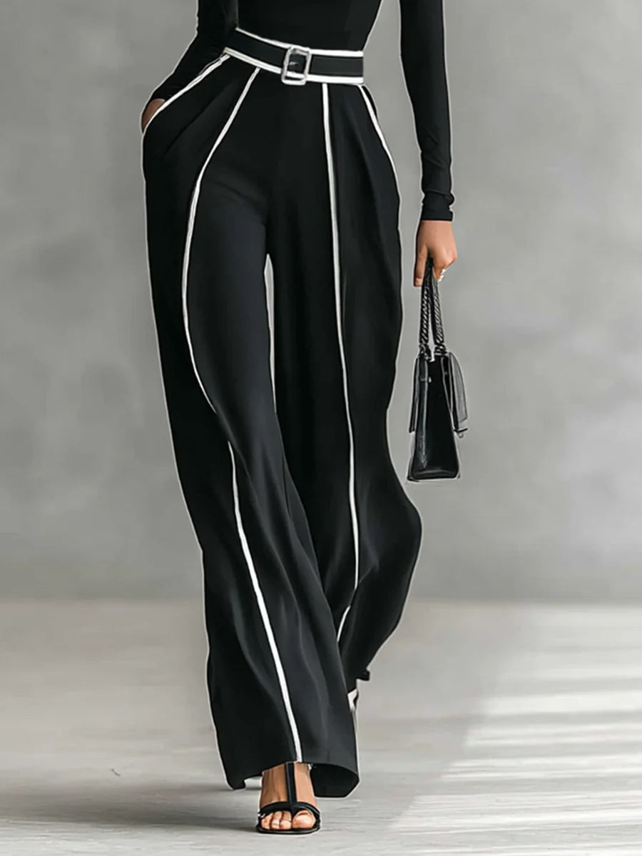 Conjunto de pantalones con cinturón y cuello alto