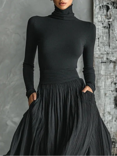 Conjunto de falda plisada y cuello alto