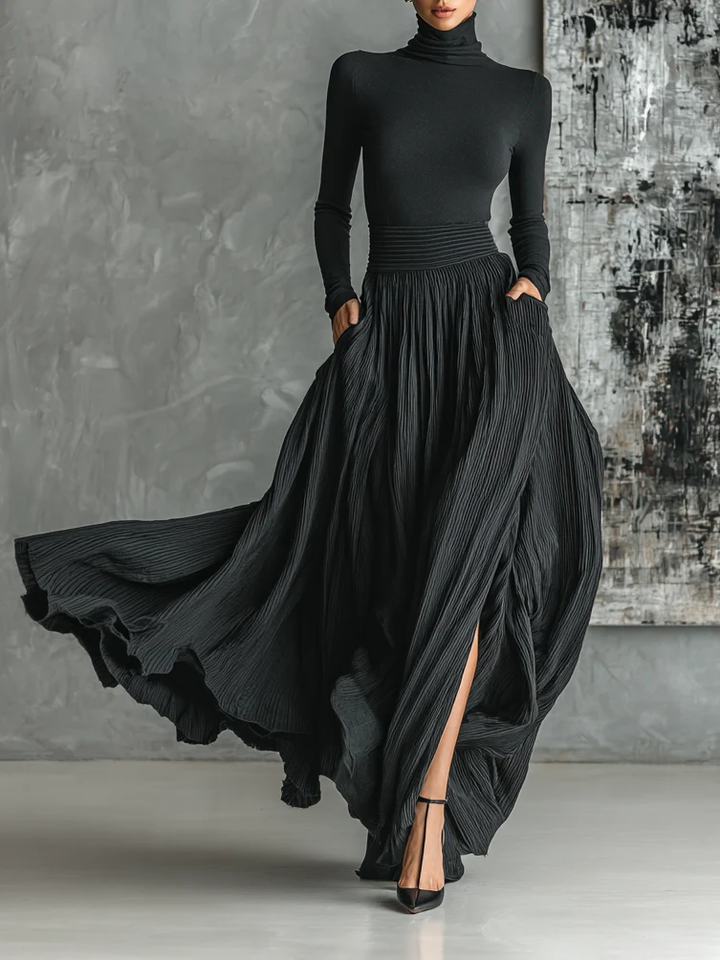 Conjunto de falda plisada y cuello alto