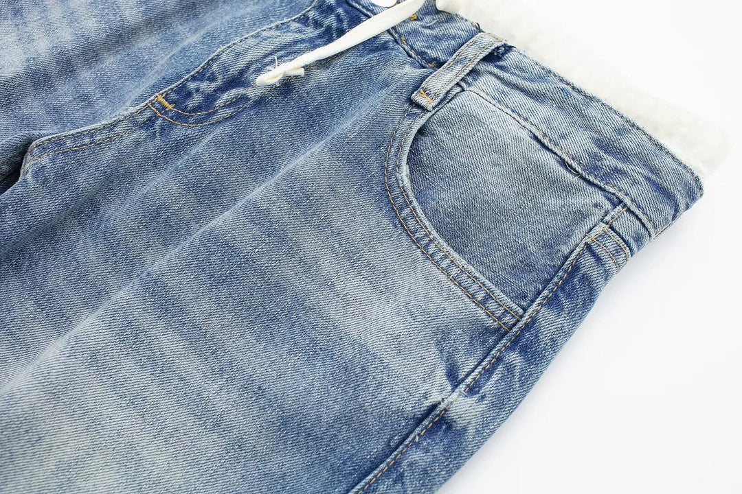 Jeans clásicos y elegantes de mujer de tiro medio con pierna recta y cordones