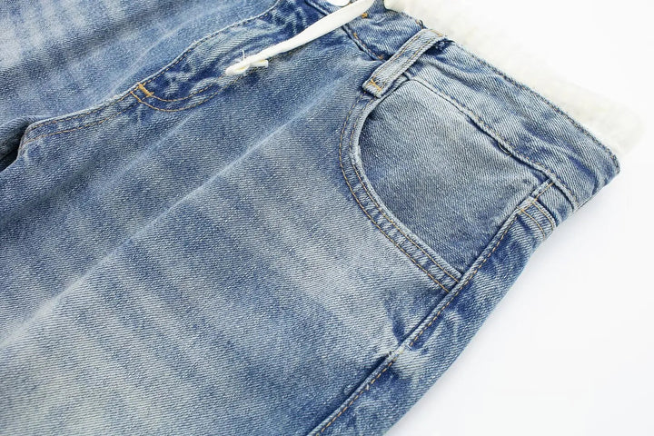 Jeans clásicos y elegantes de mujer de tiro medio con pierna recta y cordones