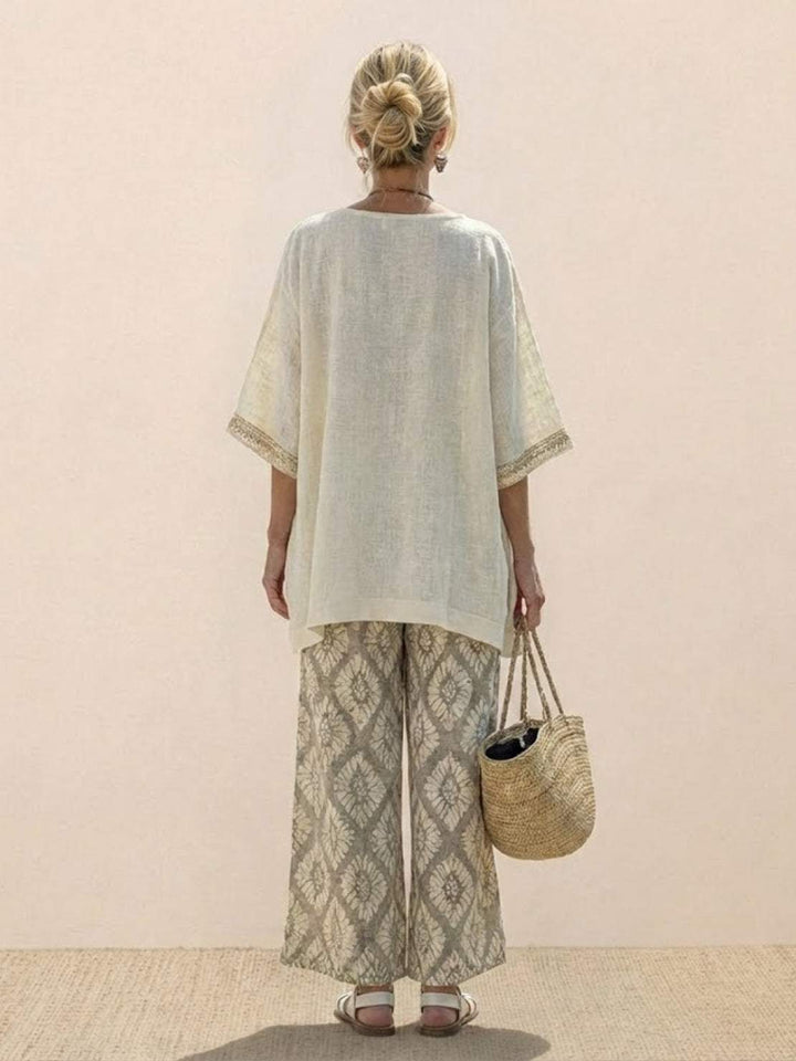Conjunto de camiseta a rayas y pantalones de pierna ancha