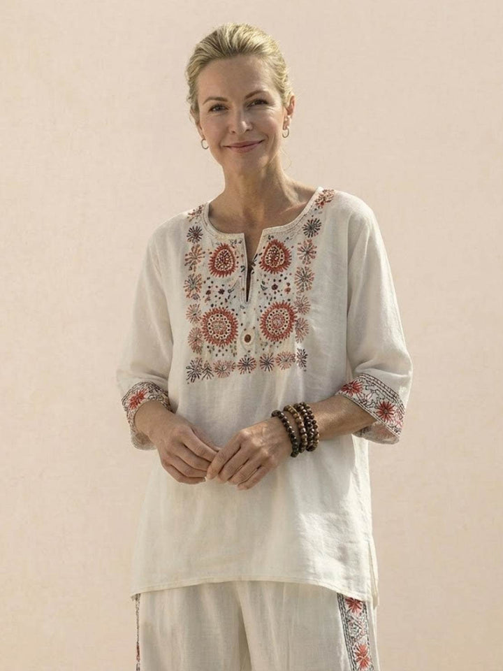 Conjunto de camiseta a rayas y pantalones de pierna ancha