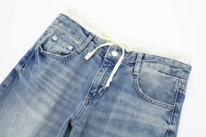 Jeans clásicos y elegantes de mujer de tiro medio con pierna recta y cordones