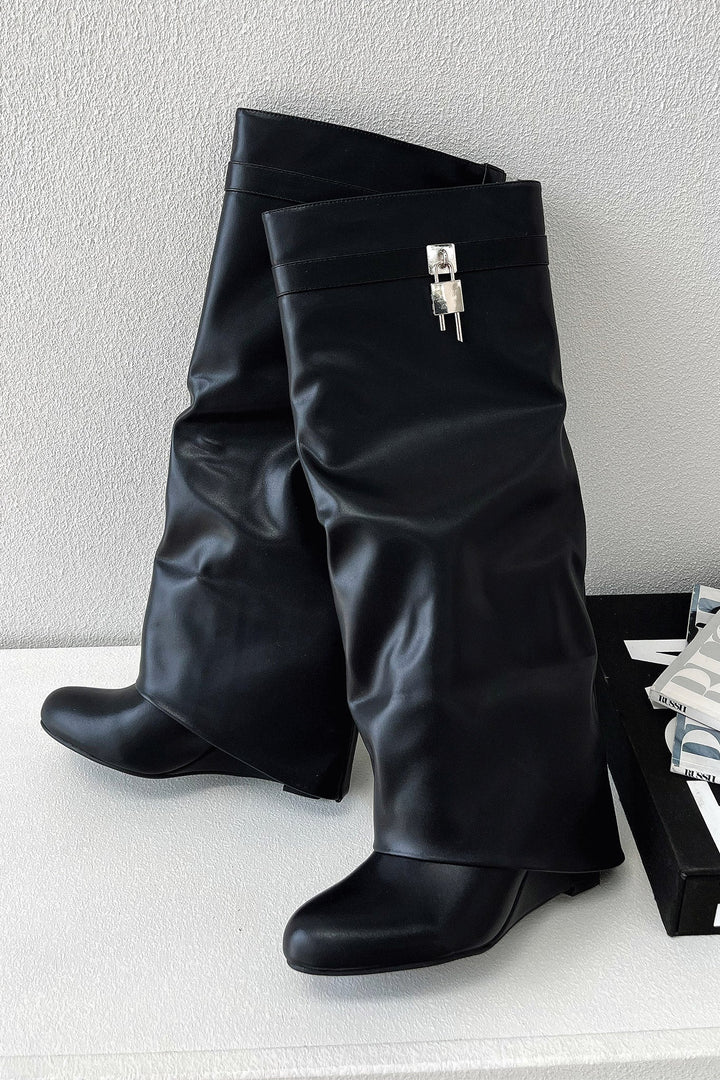 Botas negras estilo hasta la rodilla