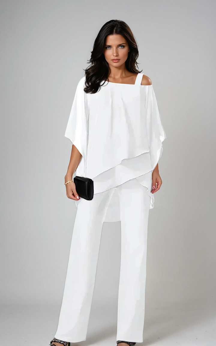 Conjunto elegante de dos piezas con capas
