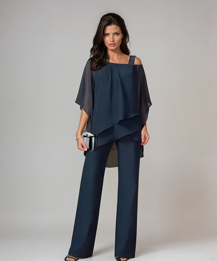 Conjunto elegante de dos piezas con capas