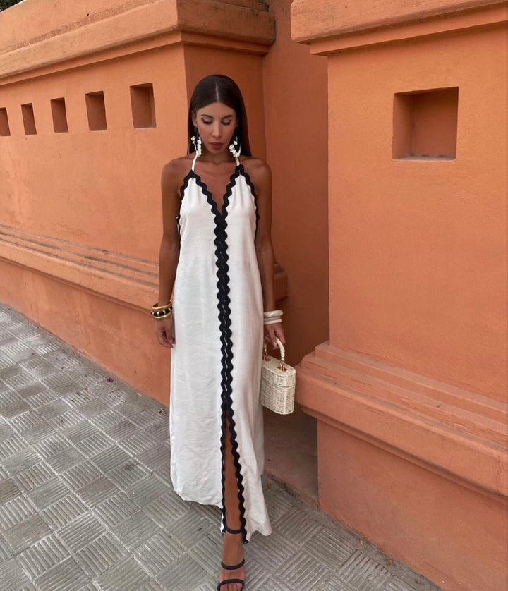 Vestido largo para invitada de boda con estilo cruzado y cintura definida