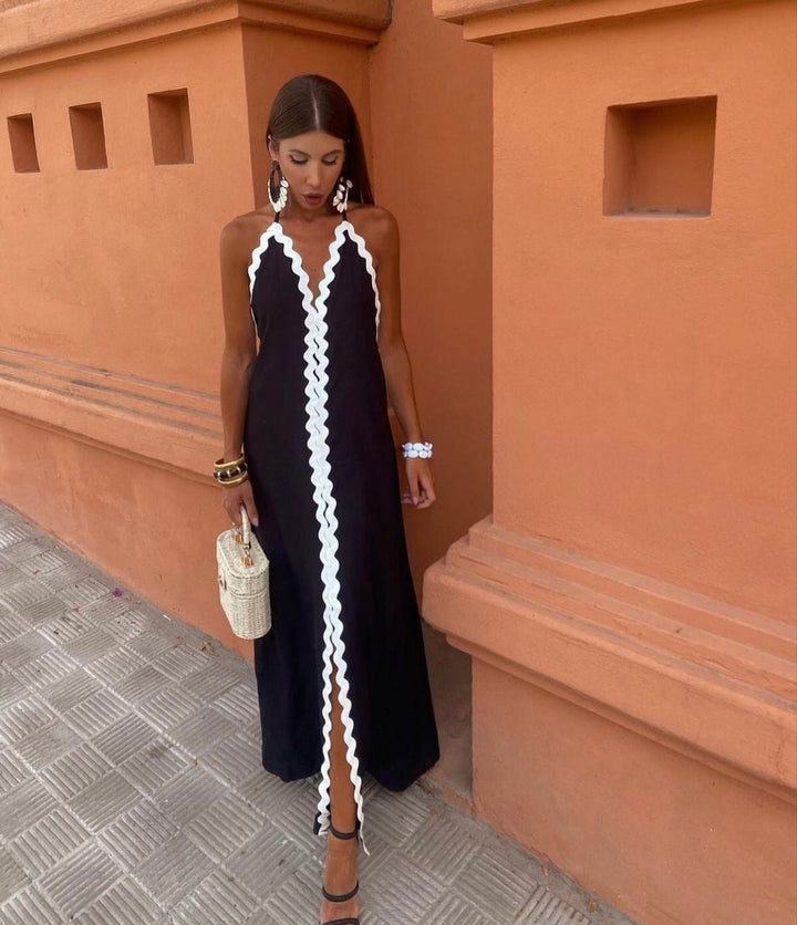 Vestido largo para invitada de boda con estilo cruzado y cintura definida
