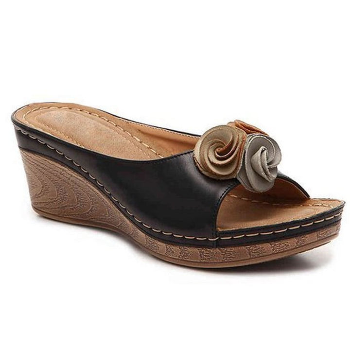 Sandalias ortopédicas con cuña elevada