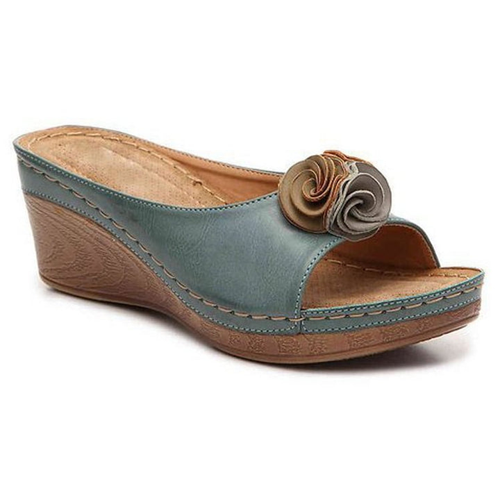 Sandalias ortopédicas con cuña elevada